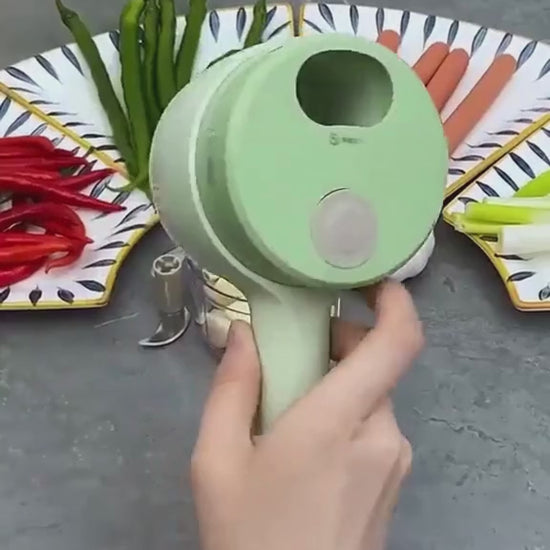 Simplify your kitchen with the Sharattn™ 4-in-1 Electric Vegetable Cutter. Wireless, portable, and easy to clean. Perfect for slicing, mincing, and peeling!
